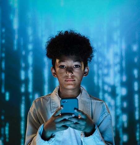a-teenager-holds-a-smartphone-surrounded-by-a-futuristic-digital-backdrop-Rev-05
